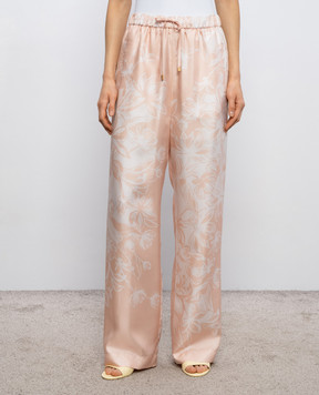 Agnona Бежеві штани із шовку в квітковий принт T70911XS4068