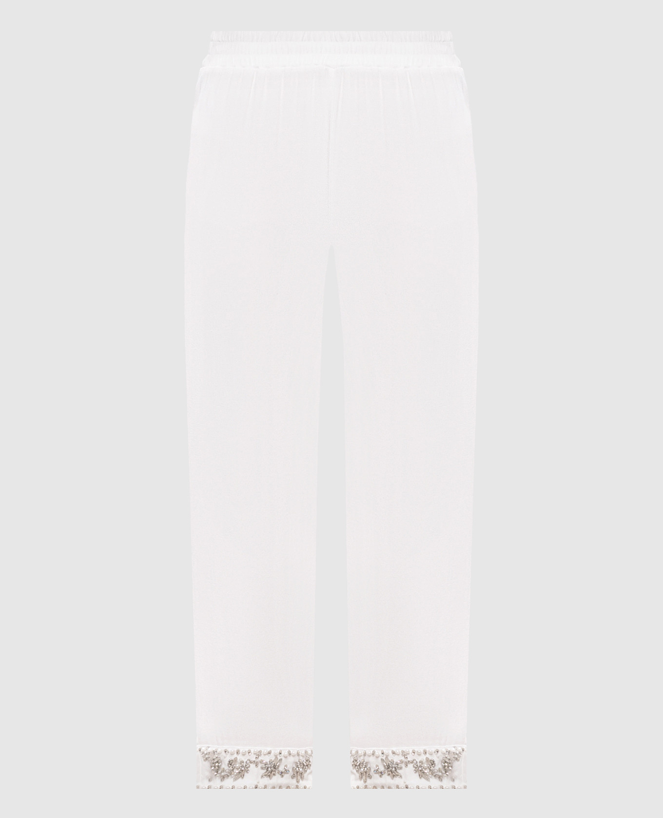 Білі штани з аплікацією