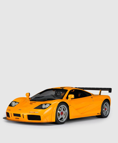Оранжевый сувенир в форме автомобиля McLaren F1 LM
