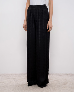 Balenciaga Чорні штани в принт логотипа 850696TTO54