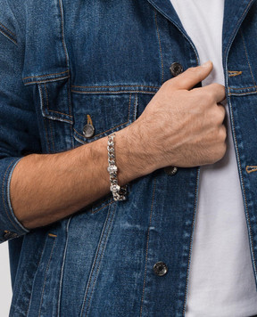 Alexander McQueen Серебристый браслет-цепочка с черепами 809458J161N