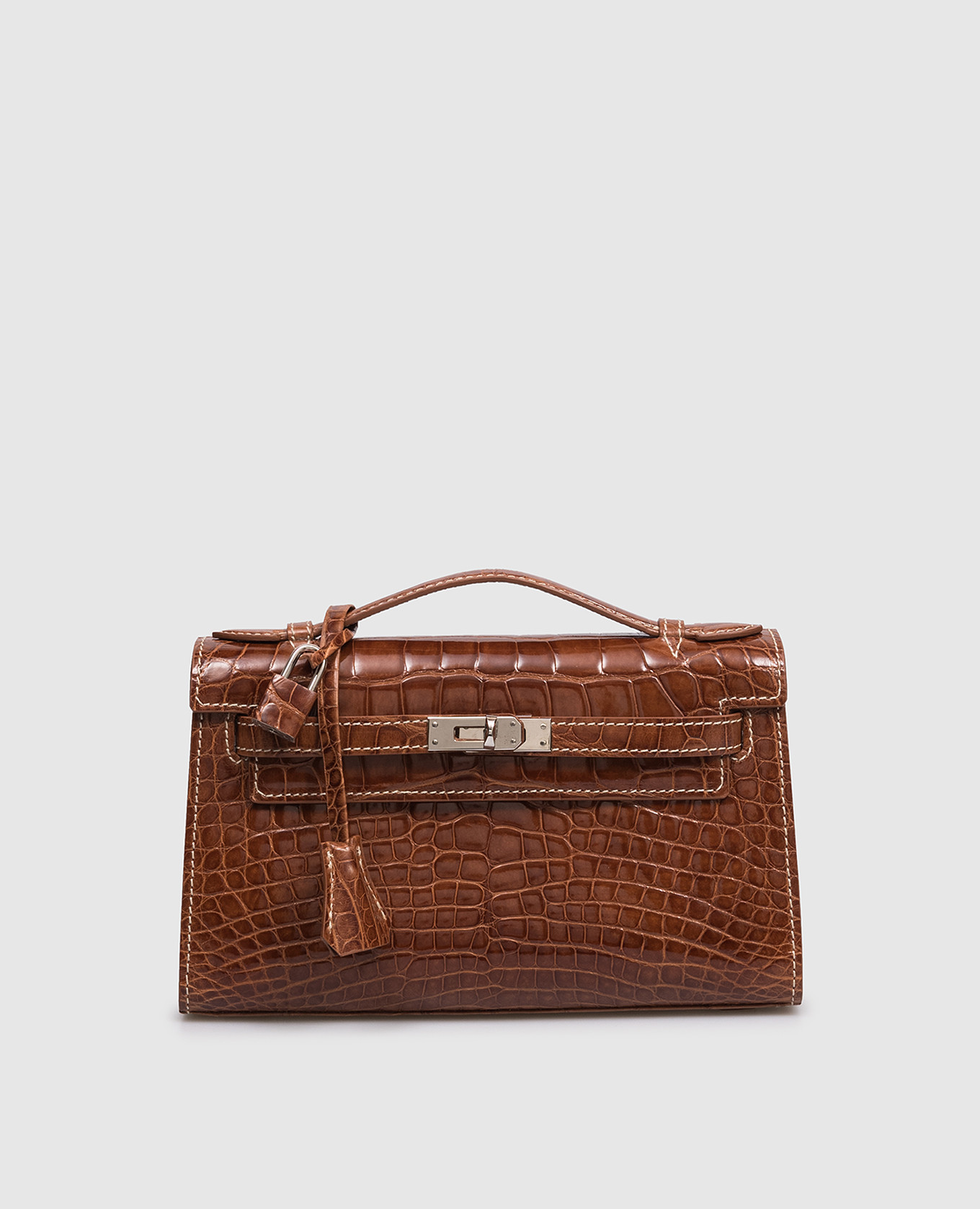 Коричневая лакированная сумка из кожи крокодила