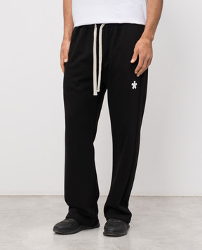 Comme des Fuckdown Чорні спортивні штани з принтом емблеми FMS6CFABM01906
