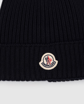 Moncler ENFANT Дитяча синя шапка з вовни з логотипом L19543B00006M1131