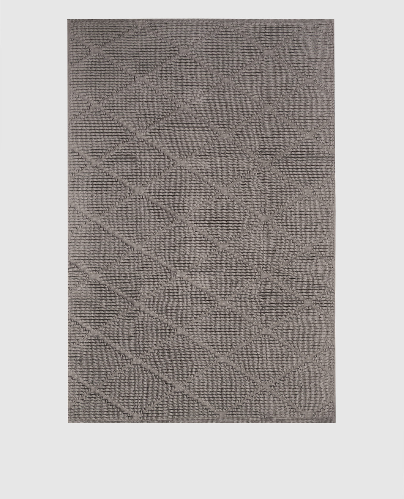 Серый коврик для ванной комнаты