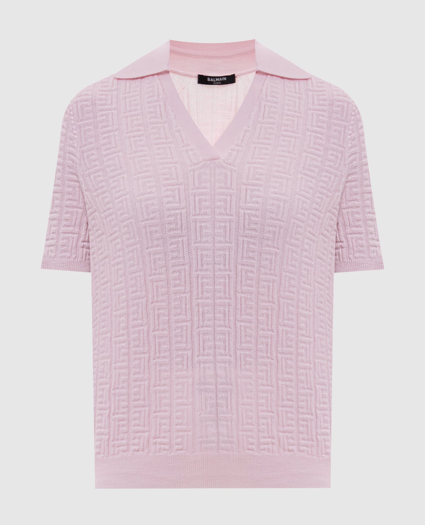 Розовое поло из шерсти в узор