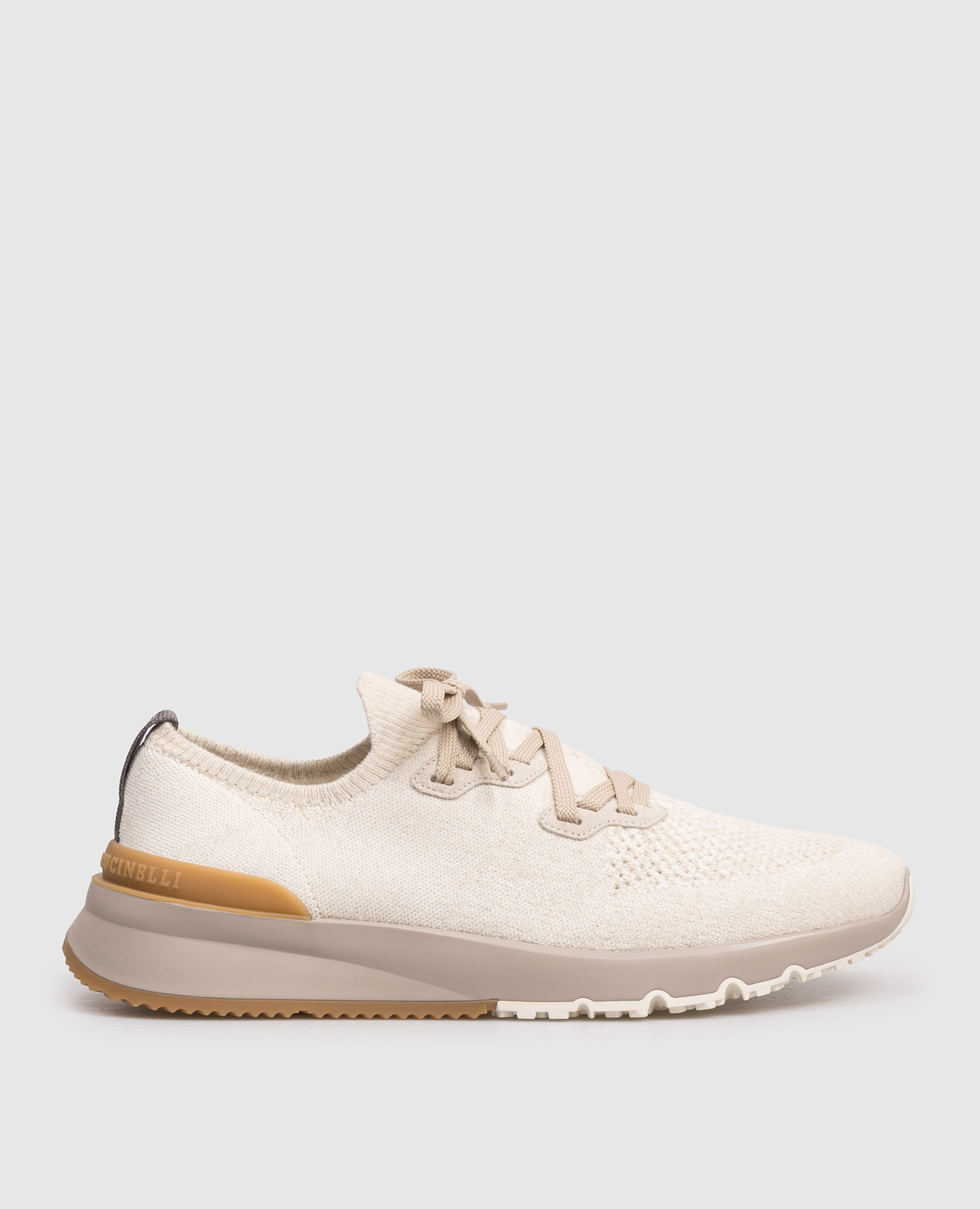 Кроссовки бежевого цвета с логотипом