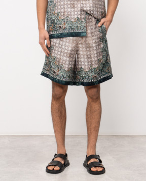 AMIRI Бежеві шорти із шовку в брендовий принт AMBMSO1036