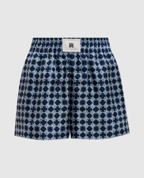 AMIRI Синие шорты из шелка в принт монограммы логотипа AWSHCA1021