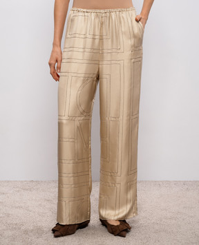 Toteme Бежевые брюки из шелка 213255707