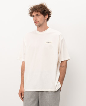 Vetements Футболка цвета айвори с принтом логотипа MH27TR148Wm