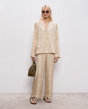 Toteme Бежевые брюки из шелка 213255707