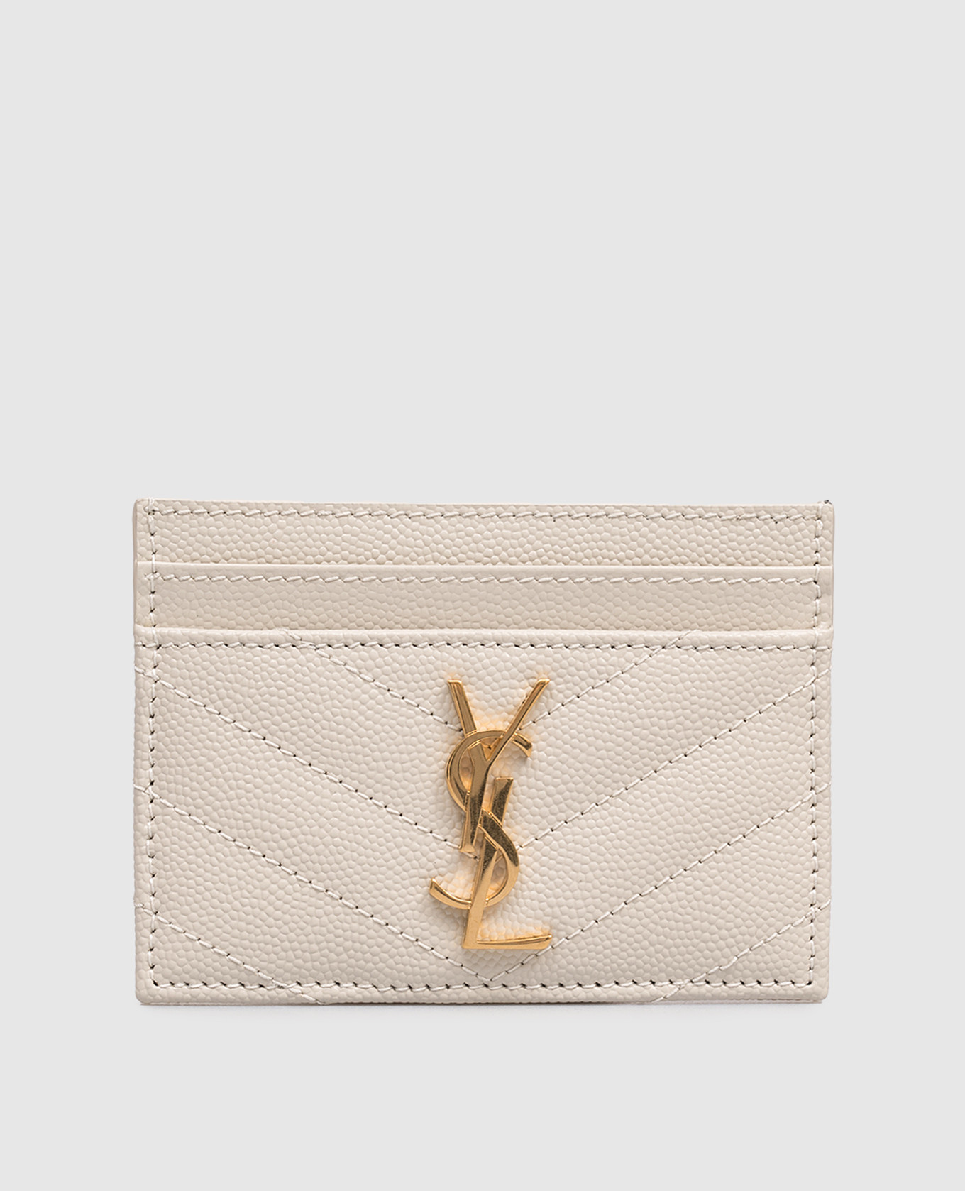 Кожаный картхолдер цвета айвори с металлической эмблемой Cassandre