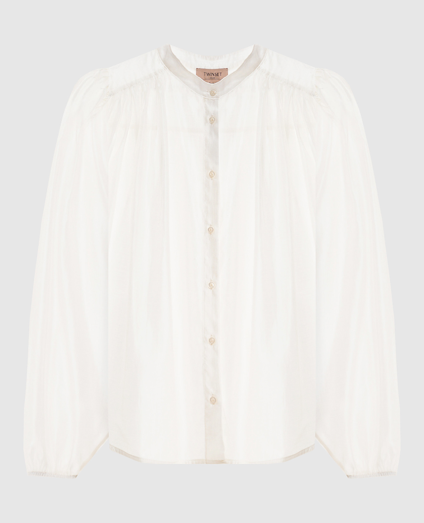 Белая блуза с драпировкой