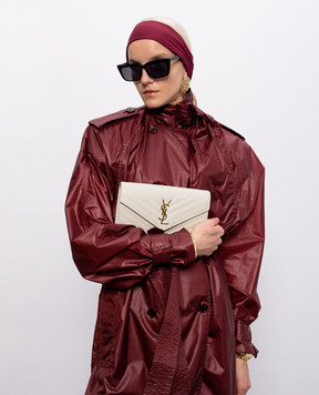 Saint Laurent Шкіряний клатч кольору айворі з емблемою Cassandre 377828BOW01