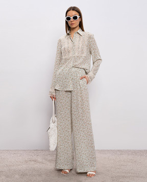 Ermanno Scervino Білі штани із шовку в принт D482P374XWE