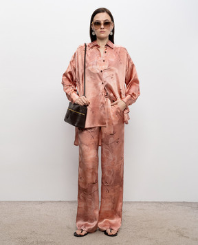 Kiton Розовые брюки из шелка в цветочный принт D48122K0873G