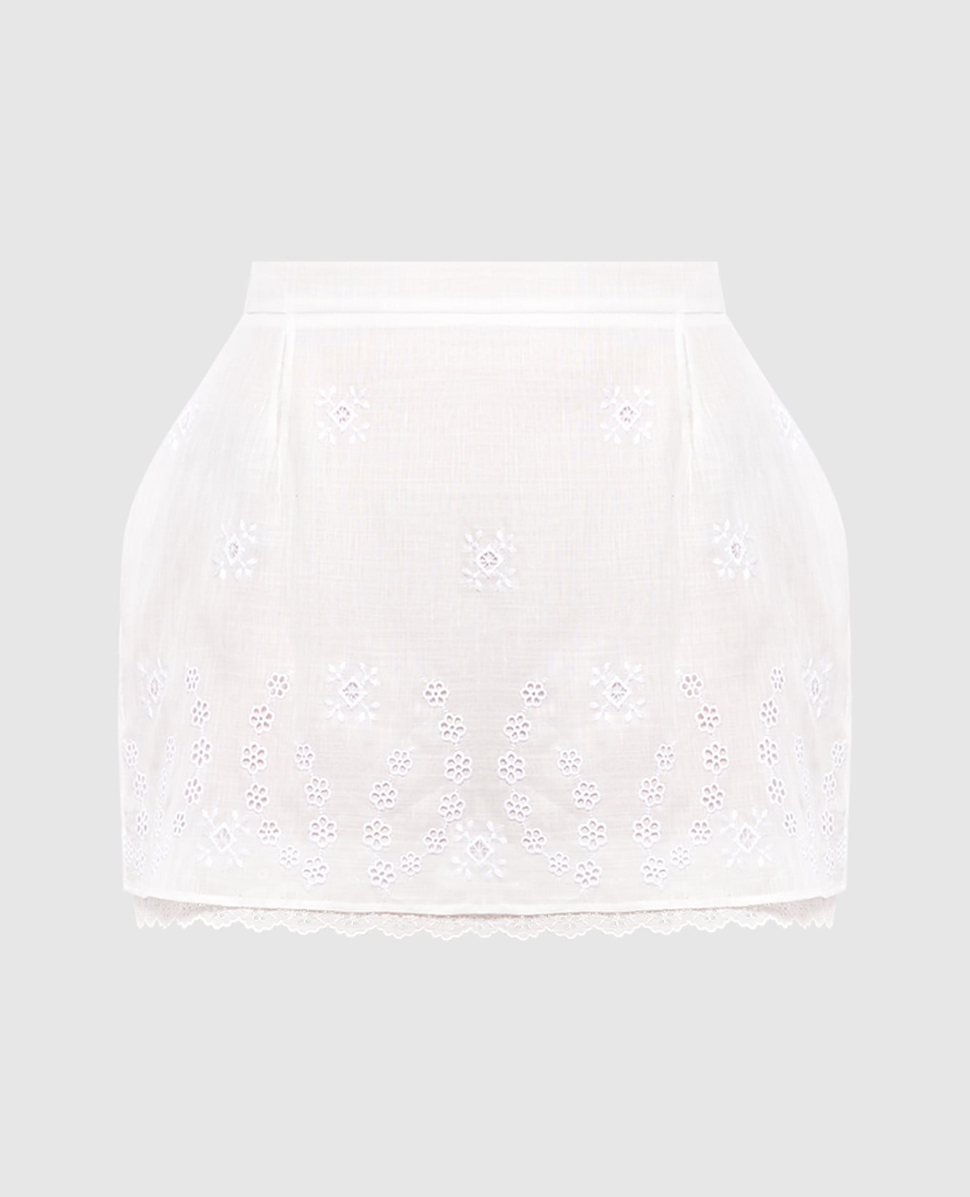 Біла спідниця міні з вишивкою