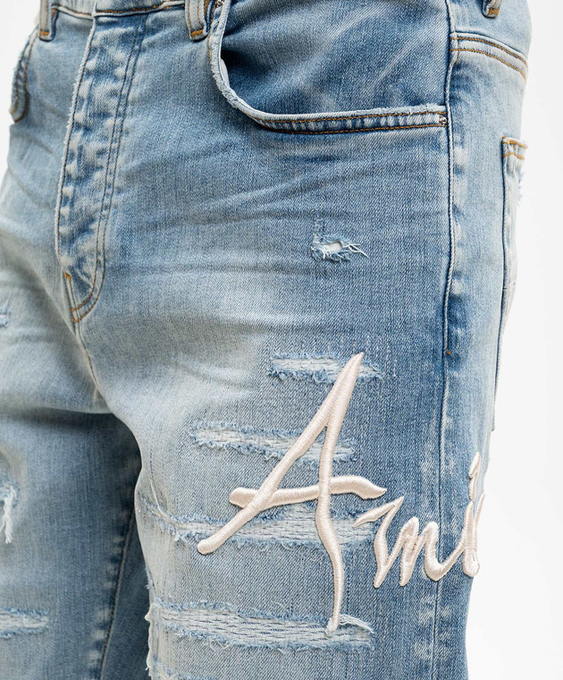 AMIRI Блакитні джинси з проріхами AMBMJE1060 зображення 5
