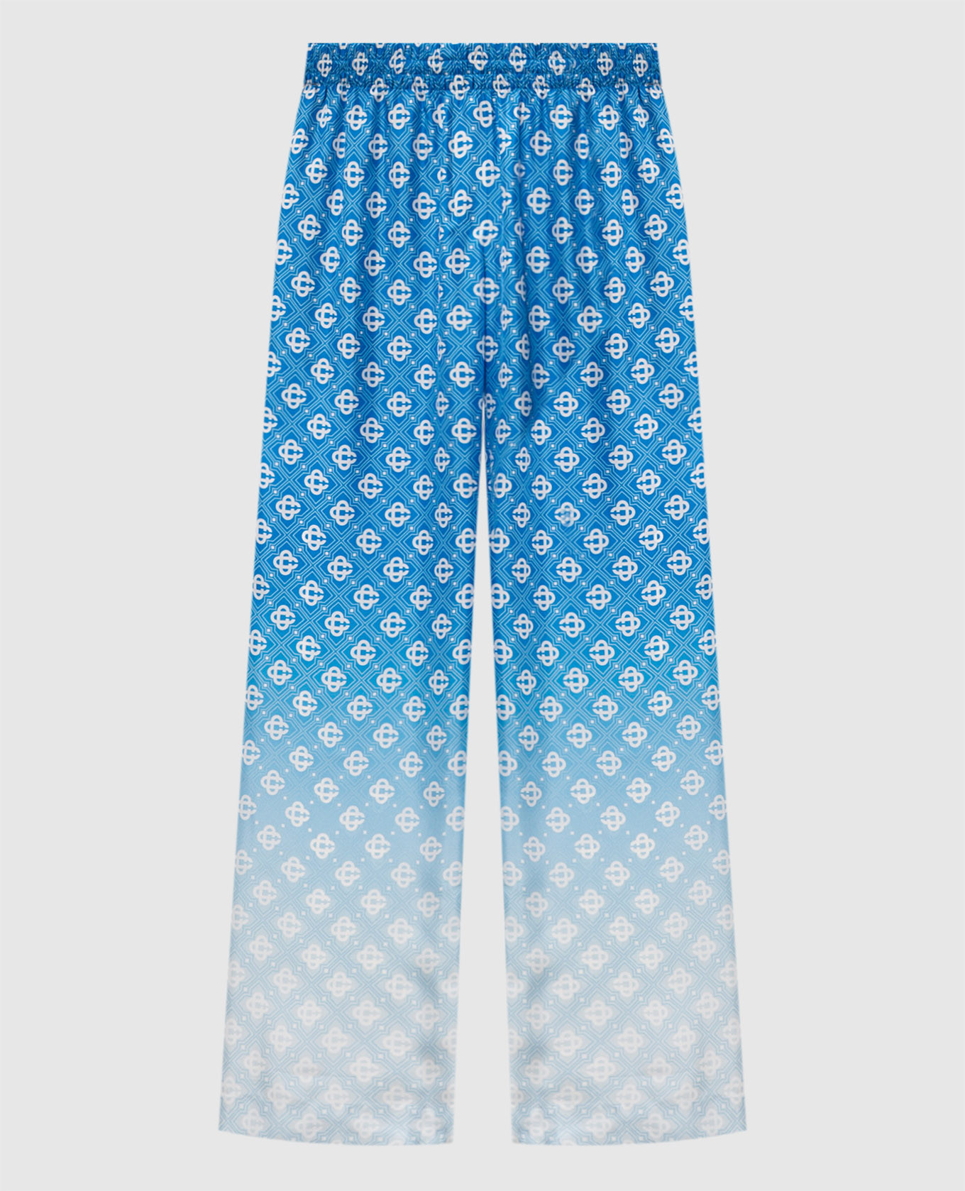 Синие брюки из шелка в принт