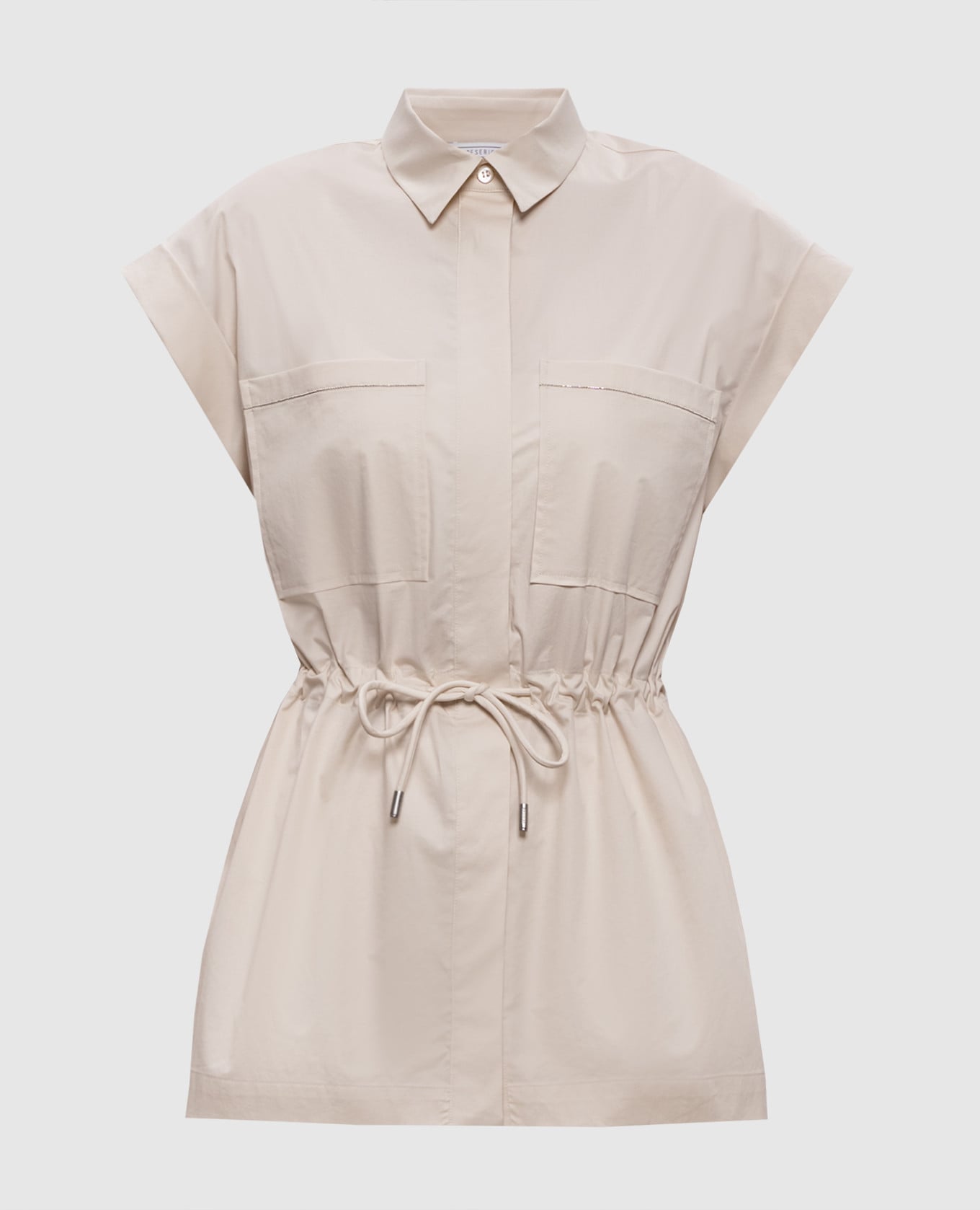 Бежева сорочка з ланцюжком моніль