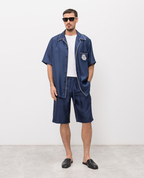 Dolce&Gabbana Синие шорты из шелка с монограммой логотипа GV5MAZGK254