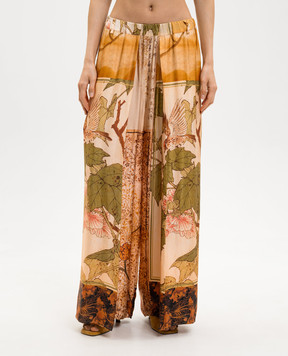 Masnada Бежеві штани в брендовий принт 8063