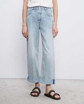 Brunello Cucinelli Блакитні джинси з патчем логотипа MA095P4005