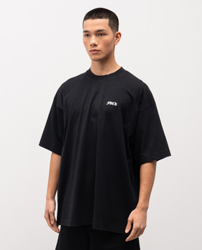 Vetements Черная футболка из хлопка с контрастным принтом ME76TR189Bm