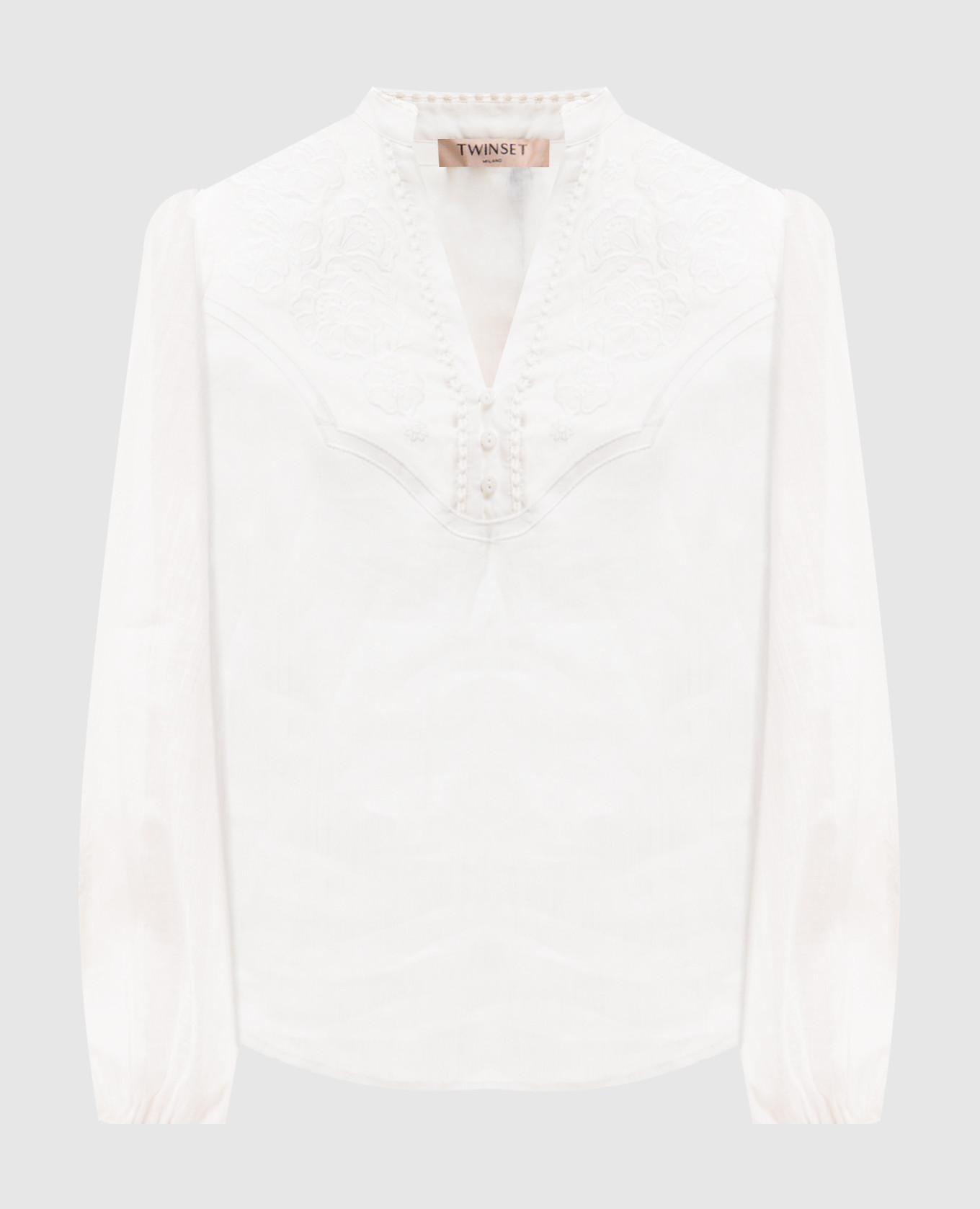 Белая блуза с цветочной вышивкой