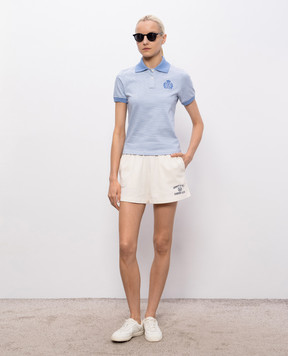 Sporty & Rich Блакитне поло NY Crest Prep в смужку з вишивкою емблеми TO10476243ST19