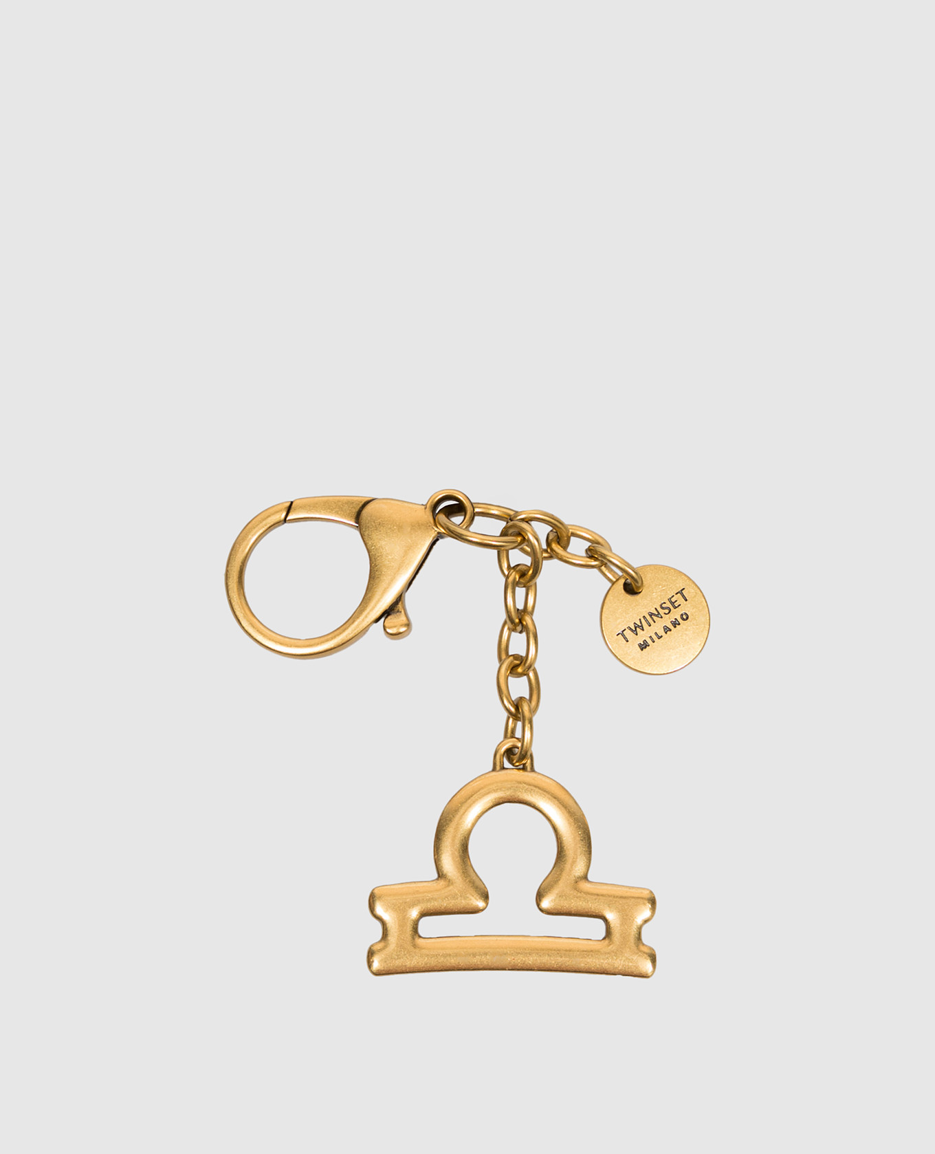 Золотистый брелок Libra
