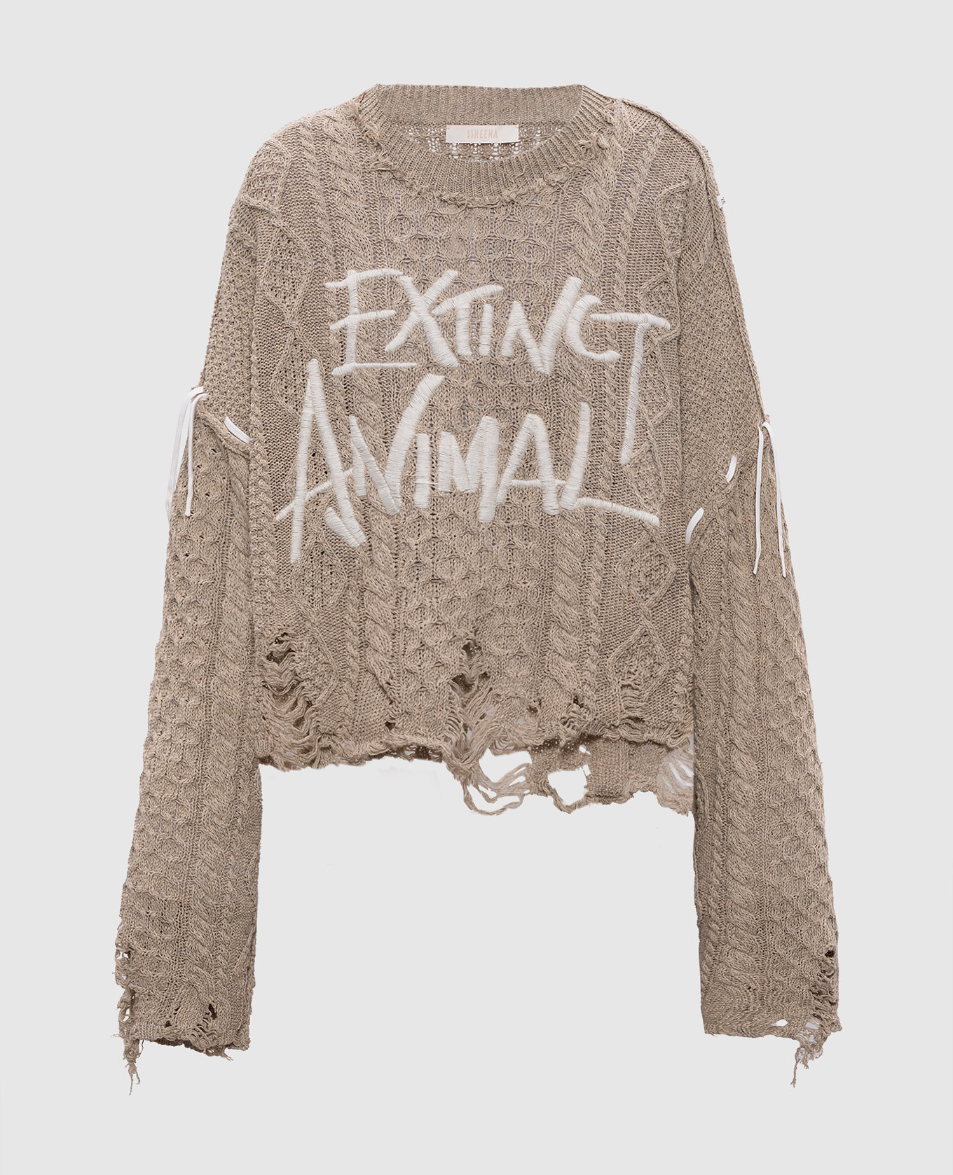 Бежевый свитер Konfetto с прорехами в узор
