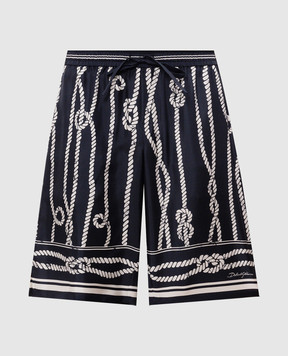 Dolce&Gabbana Темно-синие шорты из шелка в брендовый принт GV37ATHI143