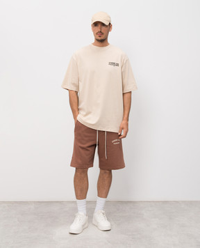 Comme des Fuckdown Бежева футболка з брендовим принтом FMS6CFABM01938