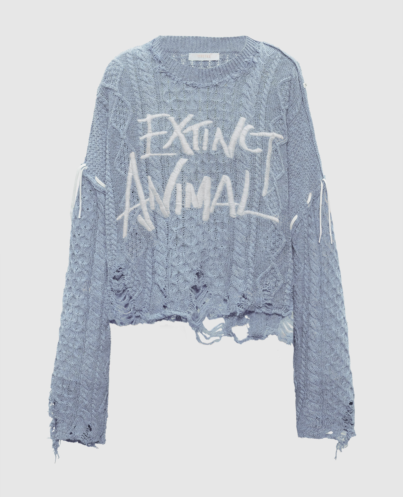 Голубой свитер Konfetto с прорехами в узор