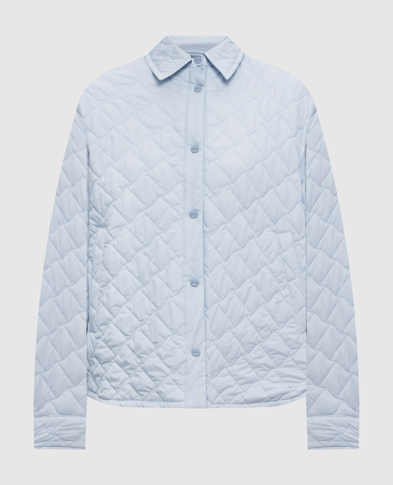 Голубая стеганная куртка