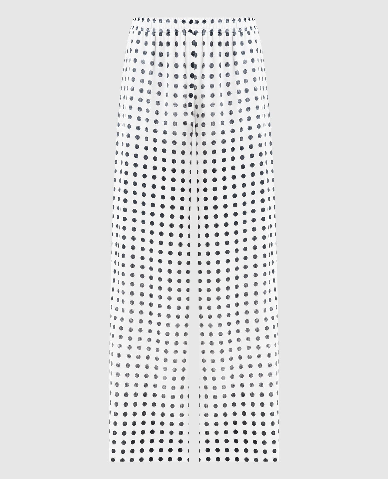 Білі штани в горох