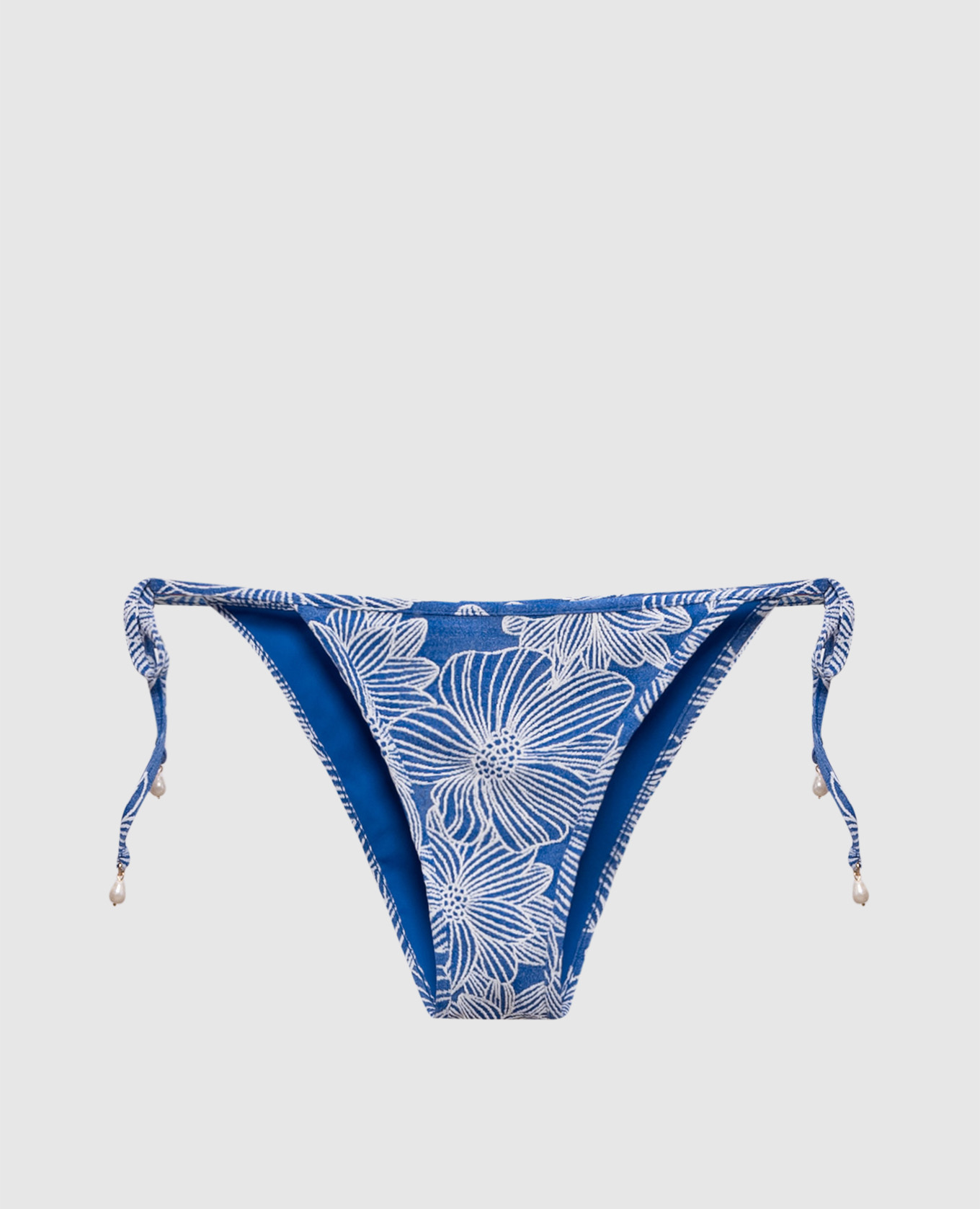 Сині труси від купальника в квітковий візерунок