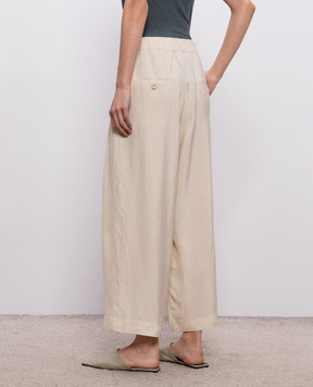 UMA WANG Бежеві штани Poetic в смужку UW3011