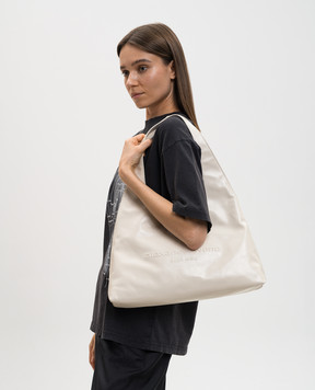 Alexander Wang Шкіряна сумка-хобо кольору айворі з фактурним логотипом 20226K62L