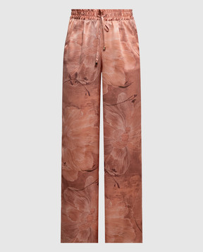 Kiton Розовые брюки из шелка в цветочный принт D48122K0873G