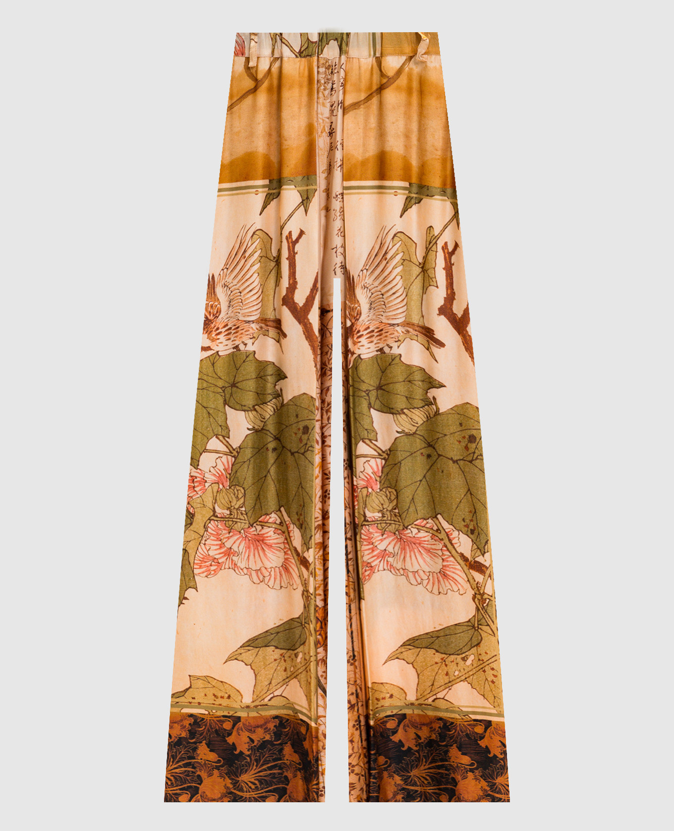 Бежеві штани в брендовий принт