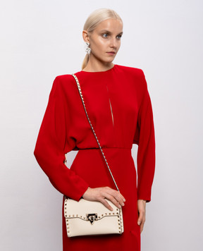 Valentino Кожаная сумка Rockstud цвета айвори 8W0B0181VSF