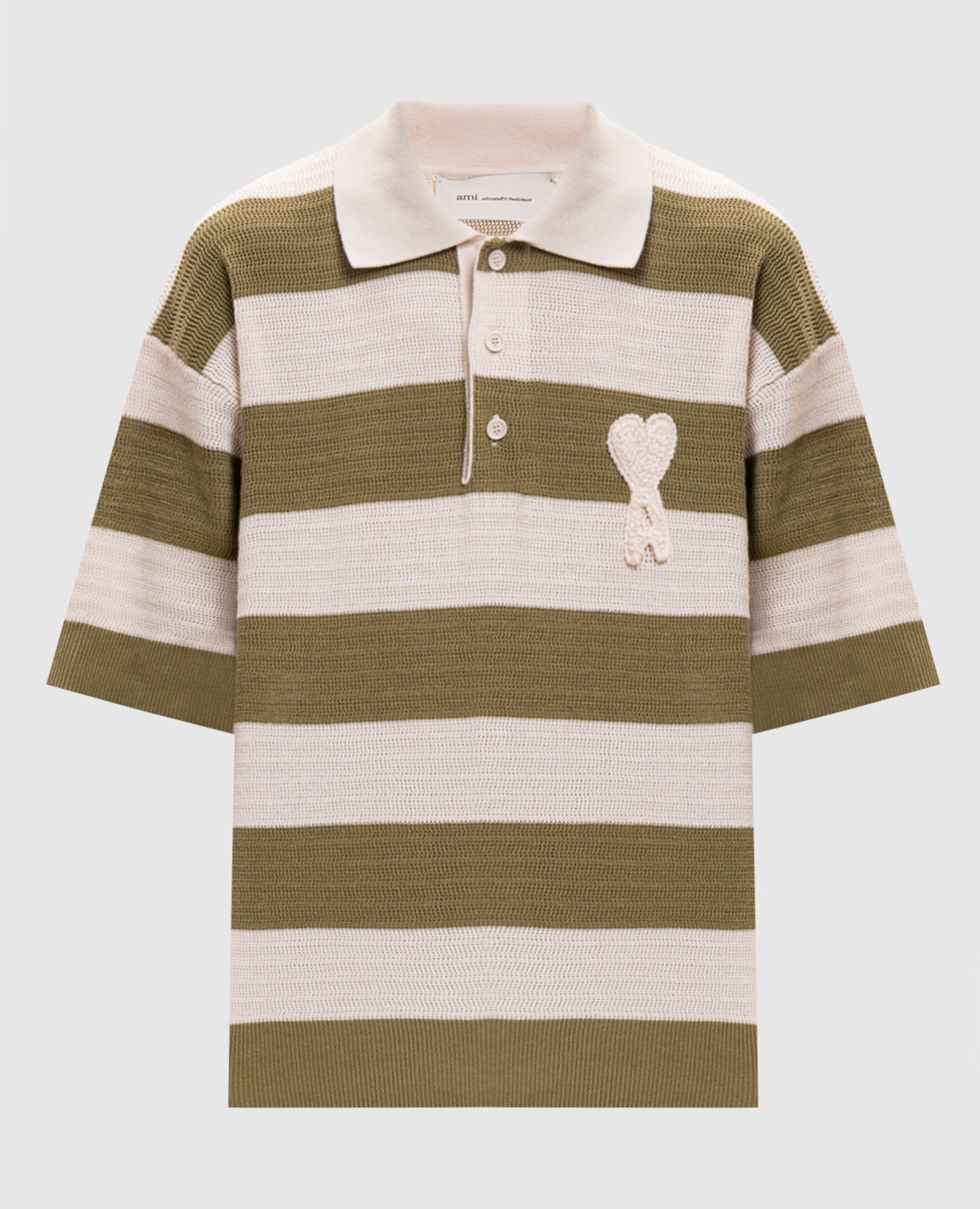 Зеленое поло в полоску с нашивкой