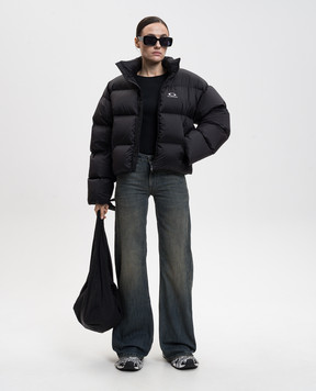 Balenciaga Сині джинси кльош з вінтажним ефектом 852328TTW76