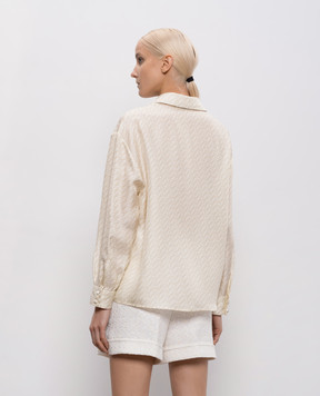 Herno Бежева блуза із шовку в брендовий принт CM000041D16009P