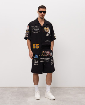 AMIRI Чорні шорти Varsity з принтом AMBMSO1028