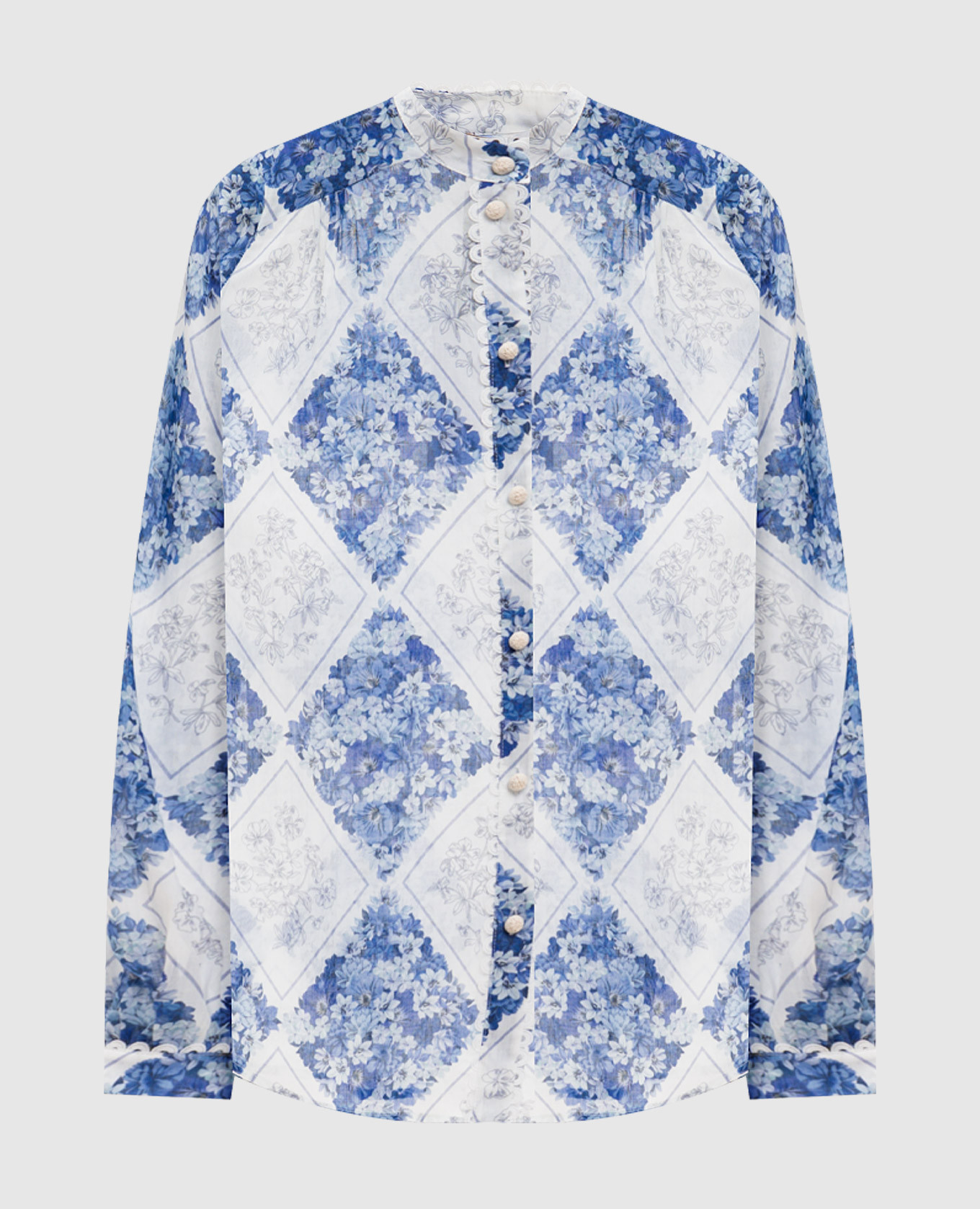 Блуза з рамі в принт