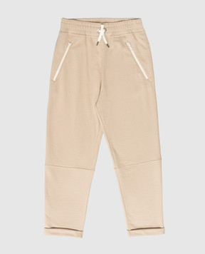 Brunello Cucinelli Детские бежевые спортивные штаны с отворотами BN05NE632C